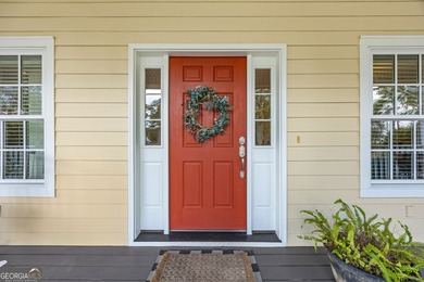 Immaculate and beautifully refreshed, this exceptional residence on The Golf Club At Sanctuary Cove in Georgia - for sale on GolfHomes.com, golf home, golf lot