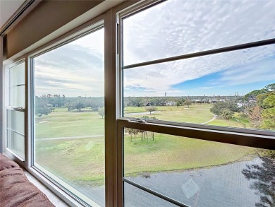 Welcome to the highly desired TOP FLOOR UNIT IN 6-story building on East Bay Golf Club in Florida - for sale on GolfHomes.com, golf home, golf lot