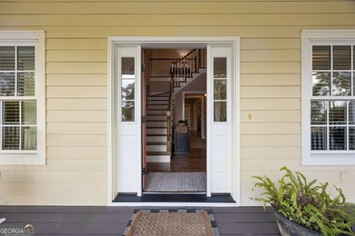 Immaculate and beautifully refreshed, this exceptional residence on The Golf Club At Sanctuary Cove in Georgia - for sale on GolfHomes.com, golf home, golf lot