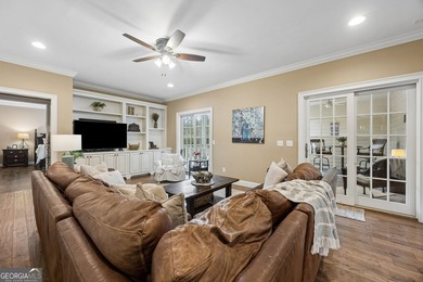 Immaculate and beautifully refreshed, this exceptional residence on The Golf Club At Sanctuary Cove in Georgia - for sale on GolfHomes.com, golf home, golf lot