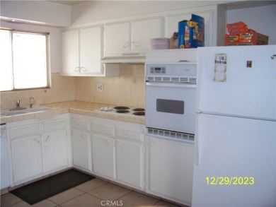 This charming property offers 2 bedrooms, 1 3/4 bath, 992 sqft on Cherry Hills Golf Club in California - for sale on GolfHomes.com, golf home, golf lot