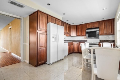 Welcome to 3520 Oaks Way Unit 1004 - a beautifully maintained on Palm-Aire Country Club and Resort - The Oaks in Florida - for sale on GolfHomes.com, golf home, golf lot