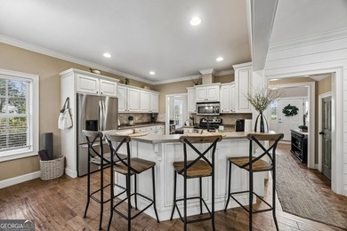 Immaculate and beautifully refreshed, this exceptional residence on The Golf Club At Sanctuary Cove in Georgia - for sale on GolfHomes.com, golf home, golf lot