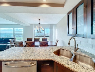 Welcome to the highly desired TOP FLOOR UNIT IN 6-story building on East Bay Golf Club in Florida - for sale on GolfHomes.com, golf home, golf lot