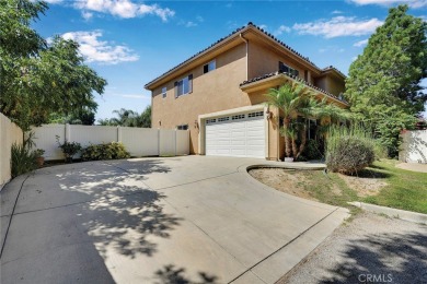 This beautiful Spanish inspired home is nestled at the end of a on Van Nuys Golf Course in California - for sale on GolfHomes.com, golf home, golf lot