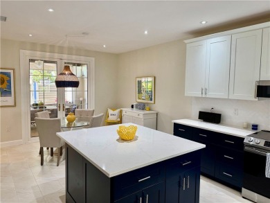 Stunningly upgraded 3 bedroom CORNER unit with 3 fantastic on Oak Harbor Country Club in Florida - for sale on GolfHomes.com, golf home, golf lot