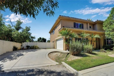 This beautiful Spanish inspired home is nestled at the end of a on Van Nuys Golf Course in California - for sale on GolfHomes.com, golf home, golf lot