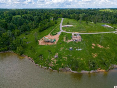 With breathtaking views of beautiful Lake Barkley, this spacious on Mineral Mound Golf Course in Kentucky - for sale on GolfHomes.com, golf home, golf lot