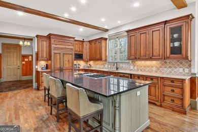 Located in the prestigious Indian Hills golf community in East on Indian Hills Country Club in Georgia - for sale on GolfHomes.com, golf home, golf lot