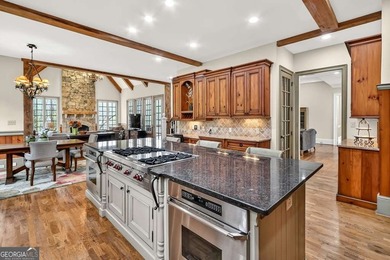 Located in the prestigious Indian Hills golf community in East on Indian Hills Country Club in Georgia - for sale on GolfHomes.com, golf home, golf lot