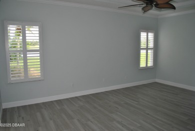 Stunning 4-bedroom, 3-bath home located in the highly desired on LPGA International Golf Course in Florida - for sale on GolfHomes.com, golf home, golf lot