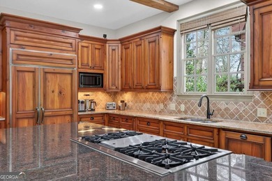 Located in the prestigious Indian Hills golf community in East on Indian Hills Country Club in Georgia - for sale on GolfHomes.com, golf home, golf lot