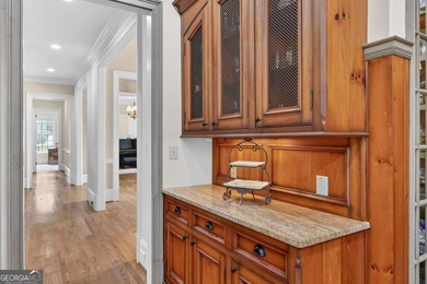 Located in the prestigious Indian Hills golf community in East on Indian Hills Country Club in Georgia - for sale on GolfHomes.com, golf home, golf lot