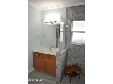 Stunning 4-bedroom, 3-bath home located in the highly desired on LPGA International Golf Course in Florida - for sale on GolfHomes.com, golf home, golf lot