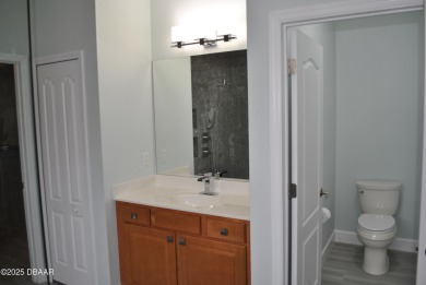 Stunning 4-bedroom, 3-bath home located in the highly desired on LPGA International Golf Course in Florida - for sale on GolfHomes.com, golf home, golf lot