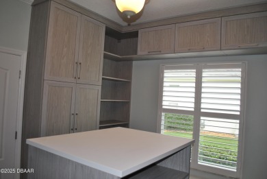 Stunning 4-bedroom, 3-bath home located in the highly desired on LPGA International Golf Course in Florida - for sale on GolfHomes.com, golf home, golf lot