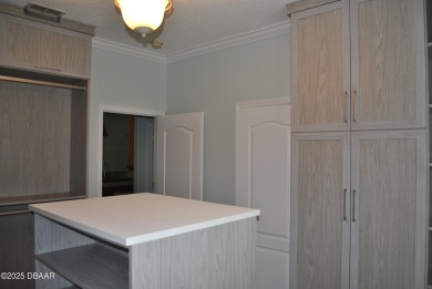 Stunning 4-bedroom, 3-bath home located in the highly desired on LPGA International Golf Course in Florida - for sale on GolfHomes.com, golf home, golf lot