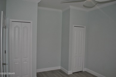 Stunning 4-bedroom, 3-bath home located in the highly desired on LPGA International Golf Course in Florida - for sale on GolfHomes.com, golf home, golf lot