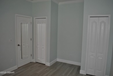 Stunning 4-bedroom, 3-bath home located in the highly desired on LPGA International Golf Course in Florida - for sale on GolfHomes.com, golf home, golf lot