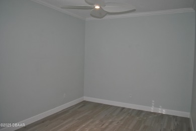 Stunning 4-bedroom, 3-bath home located in the highly desired on LPGA International Golf Course in Florida - for sale on GolfHomes.com, golf home, golf lot