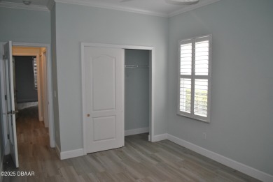 Stunning 4-bedroom, 3-bath home located in the highly desired on LPGA International Golf Course in Florida - for sale on GolfHomes.com, golf home, golf lot