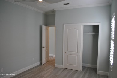 Stunning 4-bedroom, 3-bath home located in the highly desired on LPGA International Golf Course in Florida - for sale on GolfHomes.com, golf home, golf lot