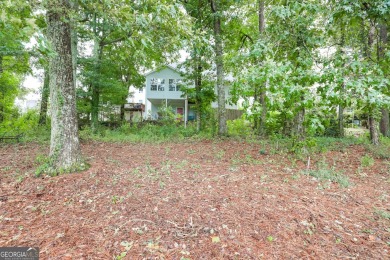 Nestled on the picturesque White Oak Golf Course with serene on Canongate On White Oak Golf Course in Georgia - for sale on GolfHomes.com, golf home, golf lot