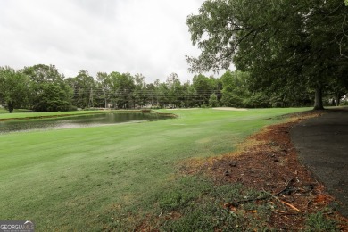 Nestled on the picturesque White Oak Golf Course with serene on Canongate On White Oak Golf Course in Georgia - for sale on GolfHomes.com, golf home, golf lot