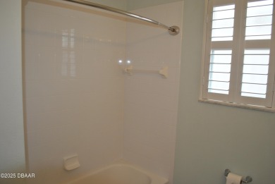 Stunning 4-bedroom, 3-bath home located in the highly desired on LPGA International Golf Course in Florida - for sale on GolfHomes.com, golf home, golf lot