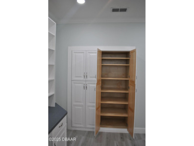 Stunning 4-bedroom, 3-bath home located in the highly desired on LPGA International Golf Course in Florida - for sale on GolfHomes.com, golf home, golf lot