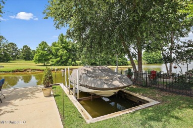 Take advantage of the price improvement on this waterfront on Lake Caroline Golf Club in Mississippi - for sale on GolfHomes.com, golf home, golf lot