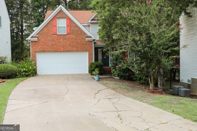 Nestled on the picturesque White Oak Golf Course with serene on Canongate On White Oak Golf Course in Georgia - for sale on GolfHomes.com, golf home, golf lot