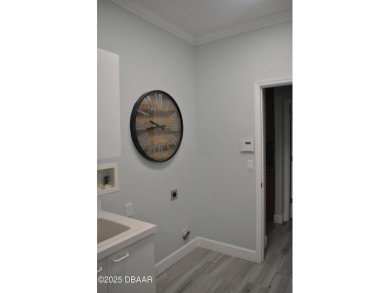 Stunning 4-bedroom, 3-bath home located in the highly desired on LPGA International Golf Course in Florida - for sale on GolfHomes.com, golf home, golf lot