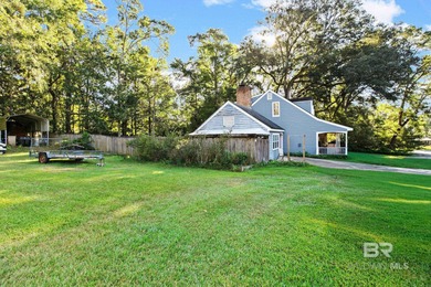 Bring your vision and unlock the potential of this spacious on Holly Hills Country Club in Alabama - for sale on GolfHomes.com, golf home, golf lot