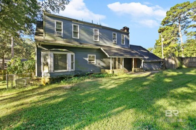 Bring your vision and unlock the potential of this spacious on Holly Hills Country Club in Alabama - for sale on GolfHomes.com, golf home, golf lot