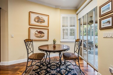 Set on an exceptional oversized wooded corner lot, nearly half on East Lake Woodlands Country Club in Florida - for sale on GolfHomes.com, golf home, golf lot