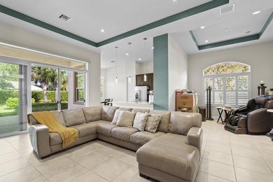 Stunning Isabella Model in PGA Verano featuring 2BR, 2 BA, a den on PGA Golf Club in PGA Village in Florida - for sale on GolfHomes.com, golf home, golf lot