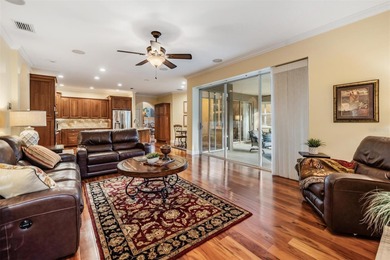 Set on an exceptional oversized wooded corner lot, nearly half on East Lake Woodlands Country Club in Florida - for sale on GolfHomes.com, golf home, golf lot