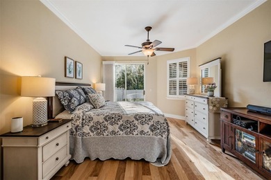 Set on an exceptional oversized wooded corner lot, nearly half on East Lake Woodlands Country Club in Florida - for sale on GolfHomes.com, golf home, golf lot