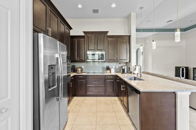 Stunning Isabella Model in PGA Verano featuring 2BR, 2 BA, a den on PGA Golf Club in PGA Village in Florida - for sale on GolfHomes.com, golf home, golf lot