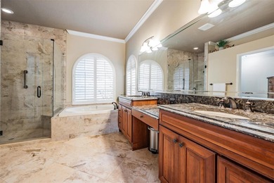 Set on an exceptional oversized wooded corner lot, nearly half on East Lake Woodlands Country Club in Florida - for sale on GolfHomes.com, golf home, golf lot