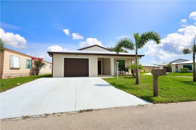 2022 Built 2/2/1 CBS with a metal roof.  The  home is situated on Spanish Lakes Country Club in Florida - for sale on GolfHomes.com, golf home, golf lot