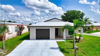 2022 Built 2/2/1 CBS with a metal roof.  The  home is situated on Spanish Lakes Country Club in Florida - for sale on GolfHomes.com, golf home, golf lot
