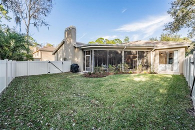 Under contract-accepting backup offers. Set on an exceptional on East Lake Woodlands Country Club in Florida - for sale on GolfHomes.com, golf home, golf lot