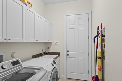 Stunning Isabella Model in PGA Verano featuring 2BR, 2 BA, a den on PGA Golf Club in PGA Village in Florida - for sale on GolfHomes.com, golf home, golf lot