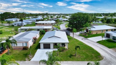 2022 Built 2/2/1 CBS with a metal roof.  The  home is situated on Spanish Lakes Country Club in Florida - for sale on GolfHomes.com, golf home, golf lot