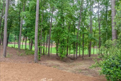 This 4600 square foot home sits on the 5th hole of the Preserve on Reynolds Lake Oconee - The Oconee in Georgia - for sale on GolfHomes.com, golf home, golf lot