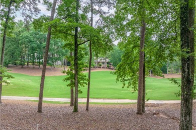 This 4600 square foot home sits on the 5th hole of the Preserve on Reynolds Lake Oconee - The Oconee in Georgia - for sale on GolfHomes.com, golf home, golf lot