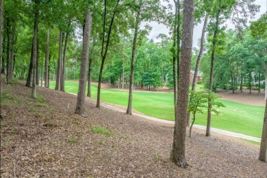 This 4600 square foot home sits on the 5th hole of the Preserve on Reynolds Lake Oconee - The Oconee in Georgia - for sale on GolfHomes.com, golf home, golf lot