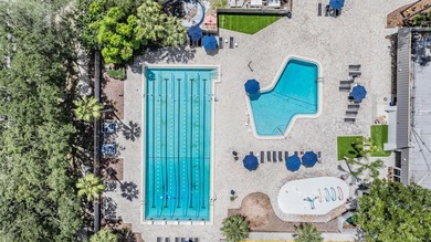 Under contract-accepting backup offers. Set on an exceptional on East Lake Woodlands Country Club in Florida - for sale on GolfHomes.com, golf home, golf lot